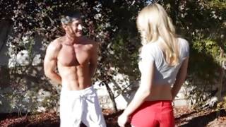 Blonde naughty gf is posing with muscular dude